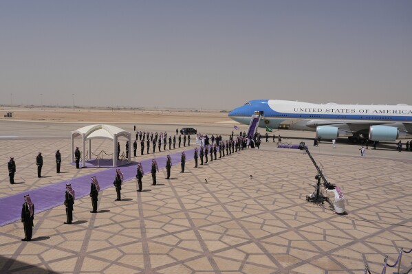 President Donald Trump walks with Saudi Crown Prince Mohammed bin Salman during an arrival ceremony at the Royal Terminal of King Khalid International Airport in Riyadh, Saudi Arabia, Tuesday, May 13, 2025.(AP Photo/Alex Brandon)