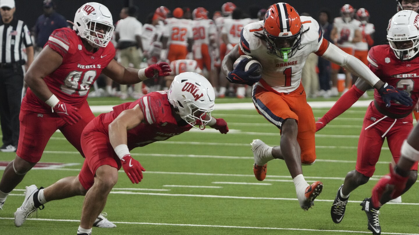 Syracuse battles back, forcing overtime and beating No. 25 UNLV 44-41, spoiling the Rebels’ poll debut