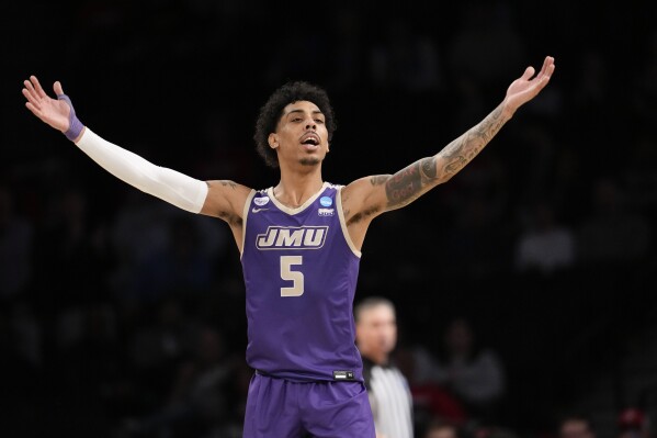 James Madison guard Terrence Edwards Jr. reacts during the second half of the team's first-round college basketball game against Wisconsin in the men's NCAA Tournament, Friday, March 22, 2024, in New York. (AP Photo/Mary Altaffer)