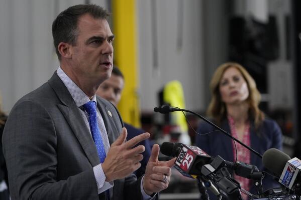 Oklahoma Gov. Kevin Stitt gestures as he speaks during a news conference Monday, May 17, 2021, in Oklahoma City. Oklahoma will end a $300-a-week federal supplemental unemployment benefit next month. (AP Photo/Sue Ogrocki)