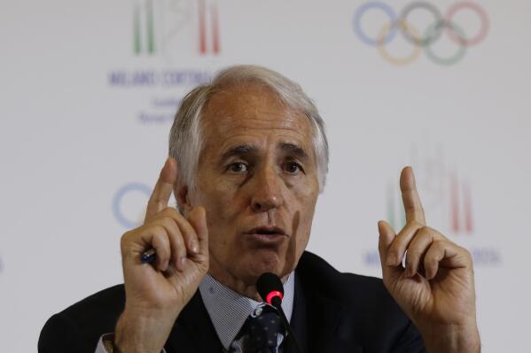 FILE - In this April 6, 2019 file photo, President of the Italian National Olympic Committee, CONI, Giovanni Malago' gestures as he talks during a winter Olympics Milan Cortina bid IOC Evaluation Commission final news conference, in Milan, Italy. Malagò is one of at least two IOC members who have tested positive for COVID-19 and been placed in isolation at the Beijing Games, as announced Wednesday, Feb. 2, 2022. (AP Photo/Luca Bruno, file)