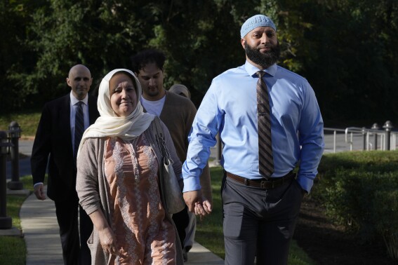 Adnan Syed and his mother Shamim Rahman arrive at Maryland's Supreme Court in Annapolis, Md., Thursday, Oct. 5, 2023, to hear arguments in an appeal by Syed, whose conviction for killing his ex-girlfriend more than 20 years ago was chronicled in the hit podcast "Serial." (AP Photo/Susan Walsh)