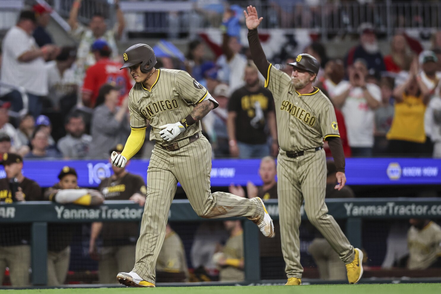 Machado homers in 9th as Padres overcome Acuña's dramatic return, beat Braves 2-1 to end 6-game skid