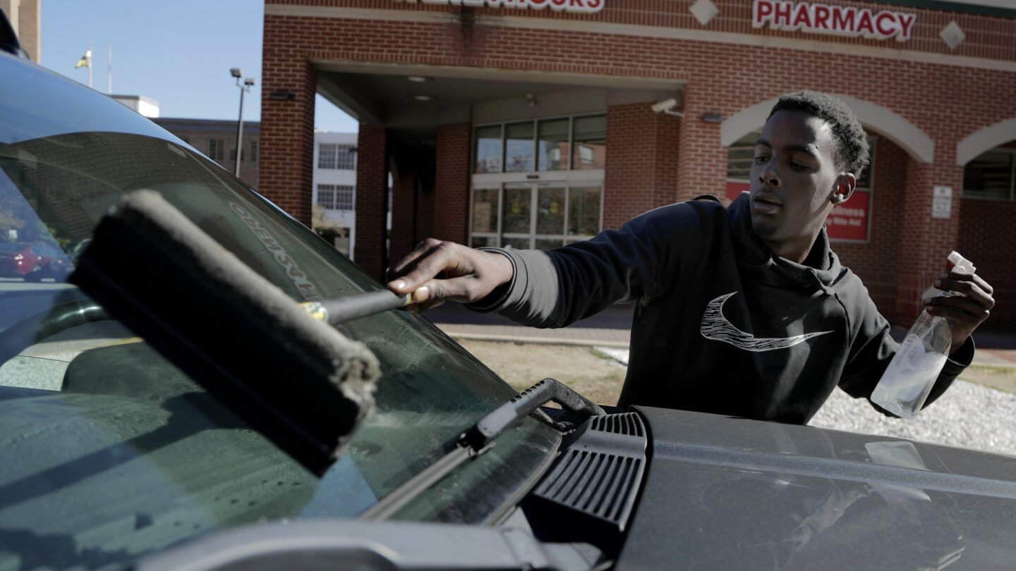 Baltimore squeegee kids find work, risks, cash at stoplights
