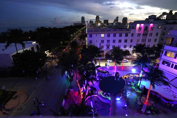 FILE - The Clevelander Hotel and Bar is shown at dusk along Ocean Drive, Friday, Sept. 24, 2021, in Miami Beach, Fla. The iconic Miami Beach hotel and bar will soon be replaced with a high-end restaurant and affordable housing units, the building's owner announced, Thursday, Sept. 7, 2023. (AP Photo/Lynne Sladky, File)