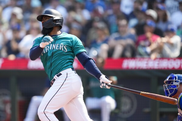 Raleigh homers twice, Mariners thump Red Sox