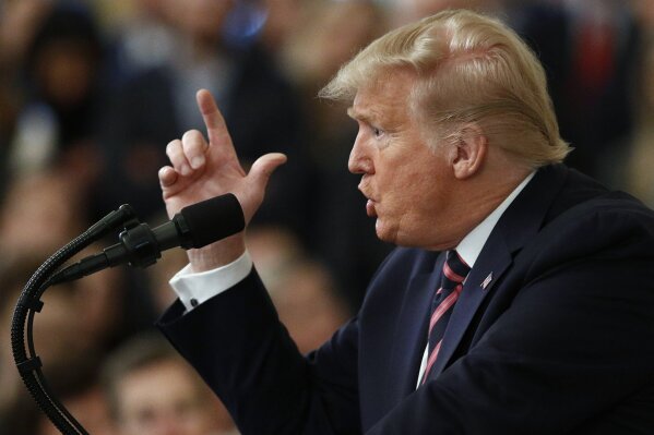 President Donald Trump gestures as he speaks in the East Room of the White House in Washington, Thursday, Feb. 6, 2020. (AP Photo/Patrick Semansky)