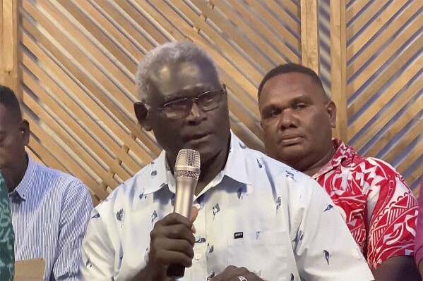 In this image taken from video, outgoing Solomon Islands Prime Minister Manasseh Sogavare speaks during a news conference, Monday, April 29, 2024, in Honiara, Solomon Islands. Sogavare on Monday withdrew from the contest to remain head of the strategically important South Pacific island nation’s government following general elections two weeks ago that are central to the U.S.-China rivalry in the region. (Australian Broadcasting Corporation via AP)