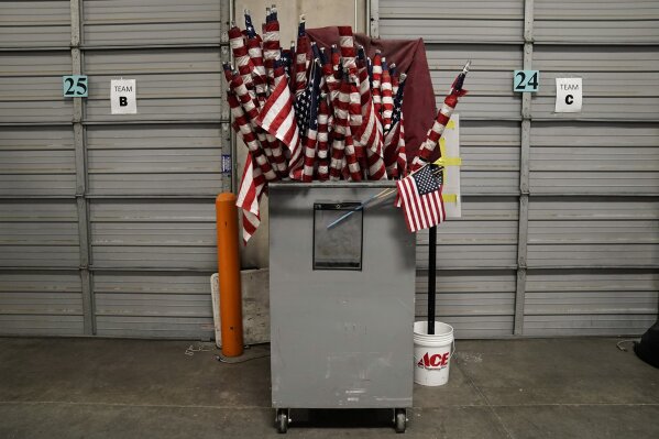 American flags used on Election Day are stored at the Clark County Election Department in North Las Vegas, Nev., Friday, Nov. 6, 2020. (AP Photo/Jae C. Hong)