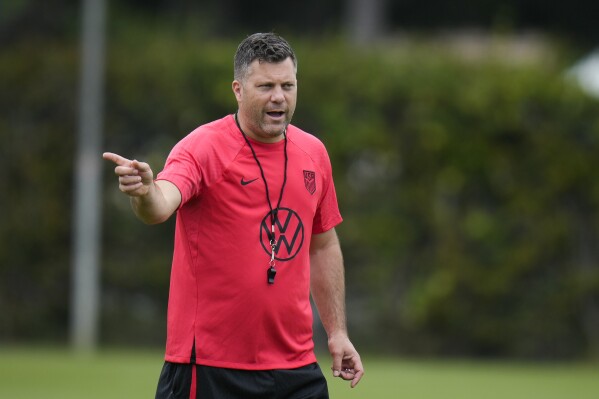 FILE - United States men's national soccer team's interim head coach B. J. Callaghan talks to his players during practice in Carson, Calif., Monday, June 5, 2023. Callaghan is leaving his role as an assistant coach on the U.S. men’s national team to become head coach of the Nashville SC. Callaghan will officially take over on July 22. (AP Photo/Jae C. Hong, File)