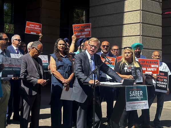 Greg Totten, a representative of Californians for Safer Communities, speaks at a press conference about a ballot initiative to bring back penalties for shoplifting and drug offenses on Wednesday, June 12, 2024 in Sacramento, Calif. The coalition blasts a plan by California Democratic leadership to void a legislative package of 14 retail theft proposals if voters approve the tough-on-crime ballot initiative in November. (AP Photo/Tran Nguyen)