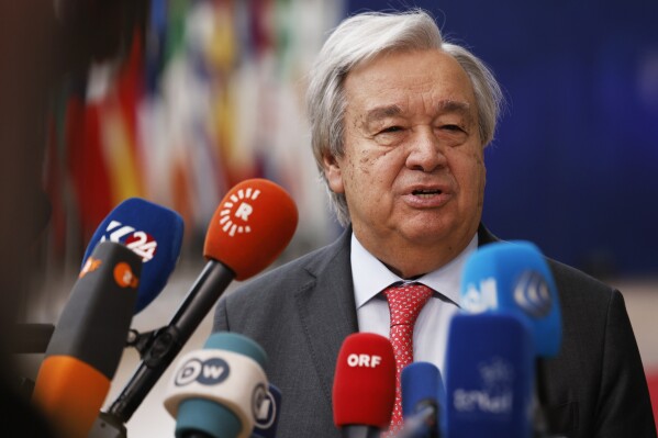 United Nations Secretary General Antonio Guterres speaks with the media as he arrives for a EU Summit in Brussels, Thursday, March 21, 2024. European Union leaders are gathering to consider new ways to help boost arms and ammunition production for Ukraine. Leaders will also discuss in Thursday's summit the war in Gaza amid deep concern about Israeli plans to launch a ground offensive in the city of Rafah. (AP Photo/Omar Havana)