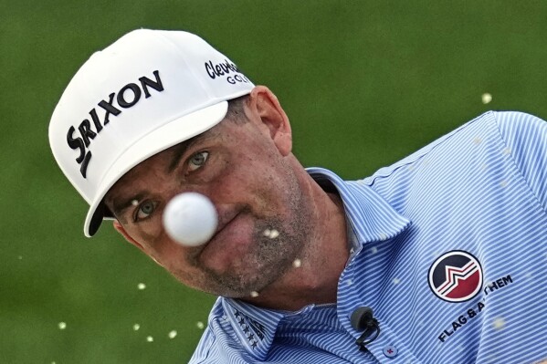 Keegan Bradley hits from the bunker on the 13th hole during a practice round for the PGA Championship golf tournament at the Quail Hollow Club, Tuesday, May 13, 2025, in Charlotte, N.C. (AP Photo/David J. Phillip)