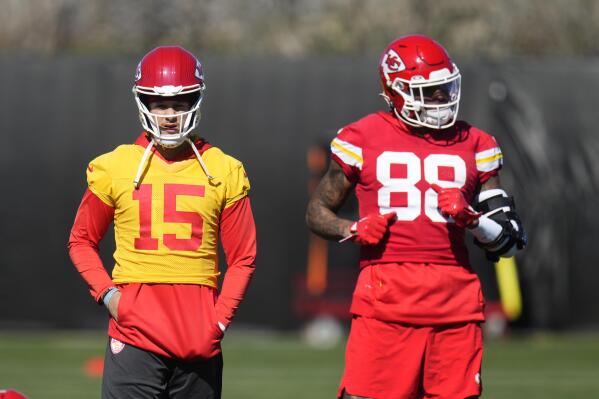 Kansas City Chiefs quarterback Patrick Mahomes (15) pauses on the field with tight end Jody Fortson (88) during an NFL football practice in Tempe, Ariz., Thursday, Feb. 9, 2023. The Chiefs will play against the Philadelphia Eagles in Super Bowl 57 on Sunday. (AP Photo/Ross D. Franklin)