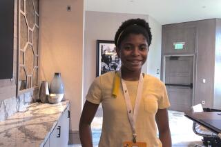 Zaila Avant-garde of Harvey, La., poses for a photo, Wednesday, July 7, 2021, at a hotel in Lake Buena Vista, Fla. where she is preparing to compete in the finals of the Scripps National Spelling Bee. With a victory, 14-year-old Zaila would become the second Black national spelling champion, and the first Black American. (AP Photo/Ben Nuckols)