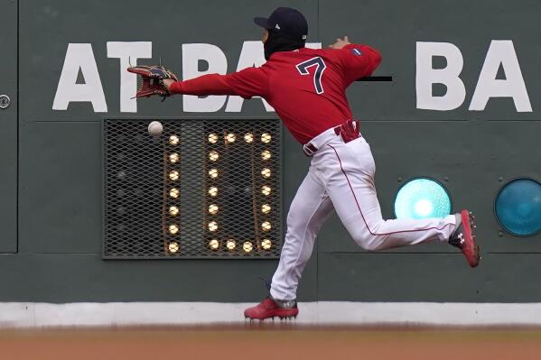 Boston Red Sox's Masataka Yoshida (7) tries to get his glove on a double hit by Pittsburgh Pirates' Bryan Reynolds in the sixth inning of a baseball game, Wednesday, April 5, 2023, in Boston. (AP Photo/Steven Senne)