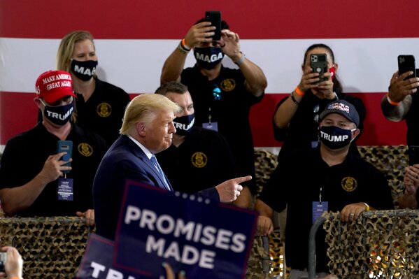 President Donald Trump arrives to speak to a crowd of supporters at the Yuma International Airport Tuesday, Aug. 18, 2020, in Yuma, Ariz. (AP Photo/Matt York)