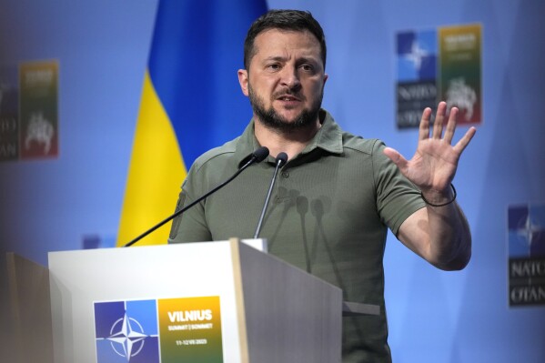 Ukraine's President Volodymyr Zelenskyy addresses a media conference at a NATO summit in Vilnius, Lithuania, Wednesday, July 12, 2023. The United States and other major industrialized nations are pledging long-term security assistance for Ukraine as it continues to fight Russia's invasion. (AP Photo/Pavel Golovkin)