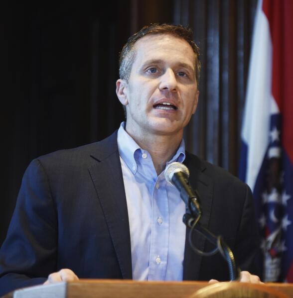 Missouri Gov. Eric Greitens speaks at a news conference about allegations related to his extramarital affair with his hairdresser, in Jefferson City, Mo., Wednesday, April 11, 2018. Greitens initiated a physically aggressive unwanted sexual encounter with his hairdresser and threatened to distribute a partially nude photo of her if she spoke about it, according to testimony from the woman released Wednesday by a House investigatory committee. (Julie Smith/The Jefferson City News-Tribune via AP)