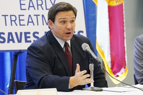 FILE - Florida Gov. Ron DeSantis complains about the FDA's decision to revoke its emergency authorization for two COVID-19 monoclonal antibody treatments during a press conference on Jan. 26, 2022, in North Miami, Fla. (AP Photo/Marta Lavandier, File)