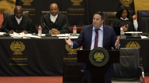 FILE - Main opposition leader of the Democratic Alliance John Steenhuisen addresses a special sitting of parliament in Cape Town, South Africa, Tuesday, Dec. 13, 2022. Six opposition parties announced Tuesday, July 4, 2023, they will discuss forming an alliance for South Africa's national election next year in an attempt to end the 30-year hold on power of the African National Congress. (AP Photo/Nardus Engelbrecht, File)