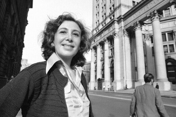 Susan Brownmiller poses on the streets of lower Manhattan in New York, Oct. 18, 1975. (AP Photo/Suzanne Vlamis, File)