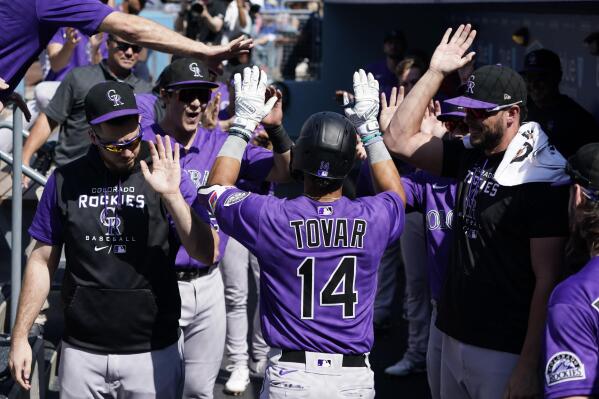 Rockies turn in 4th straight losing year after losing Bryant | AP News