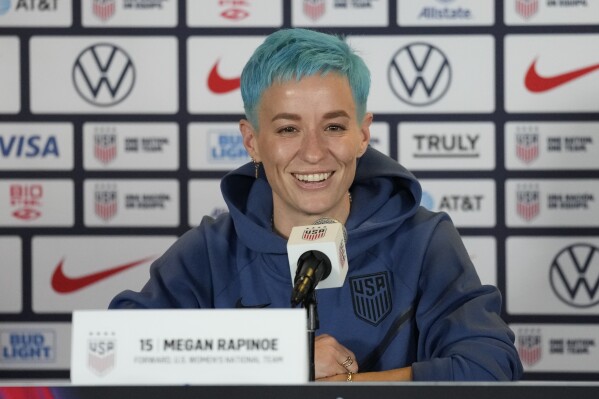 FILE- U.S soccer player Megan Rapinoe speaks to reporters during the 2023 Women's World Cup media day for the United States Women's National Team in Carson, Calif., Tuesday, June 27, 2023. Days before heading to her fourth World Cup, Rapinoe announced she’ll retire at the end of the National Women's Soccer League season. Rapinoe, 38, made the announcement on Twitter Saturday, July 8, 2023. (AP Photo/Ashley Landis, File)