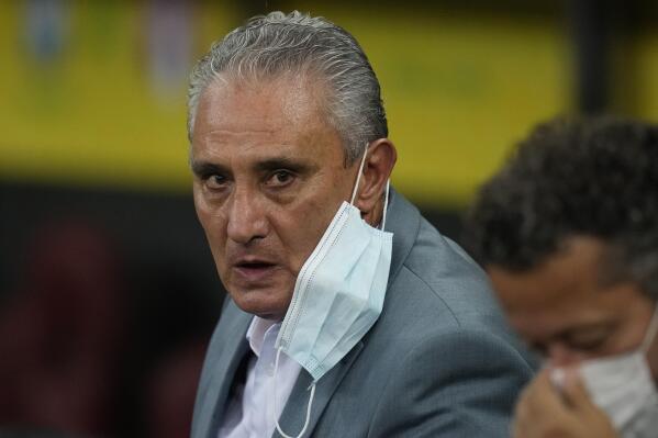Brazil's coach Tite looks on prior a qualifying soccer match against Peru for the FIFA World Cup Qatar 2022 at Pernambuco Arena in Recife, Brazil, Thursday, Sept.9, 2021. (AP Photo/Andre Penner)