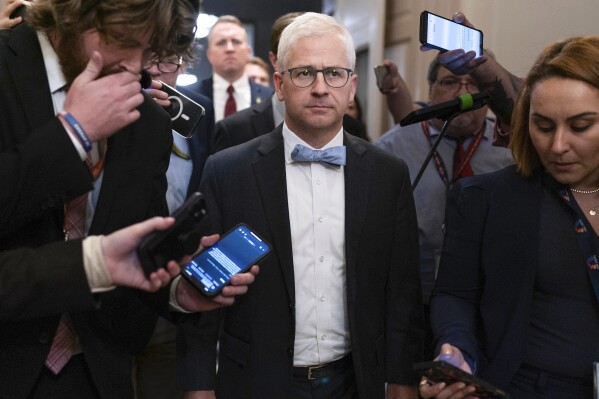 Rep. Patrick McHenry, R-N.C., the temporary leader of the House of Representatives and the speaker pro tempore, leaves the Republican caucus meeting at the Capitol in Washington, Thursday, Oct. 12, 2023. (AP Photo/Jose Luis Magana)