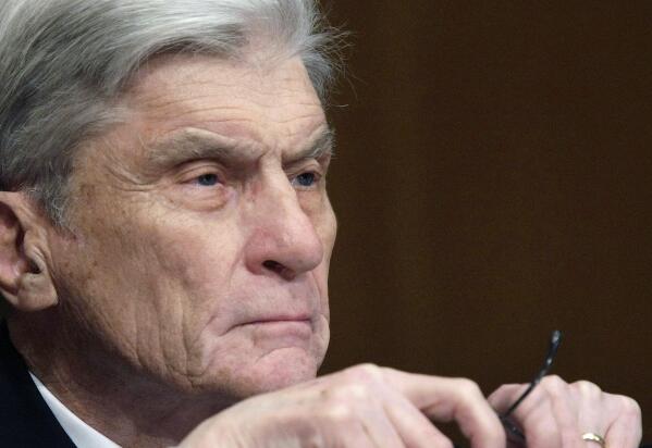 ** FILE ** In this April 8, 2008 file photo, then Senate Armed Services Committee member Sen. John Warner, R-Va., listens to testimony on Capitol Hill in Washington. Warner, a former Navy secretary and one of the Senate’s most influential military experts, has died at 94.  (AP Photo/Pablo Martinez Monsivais, File)