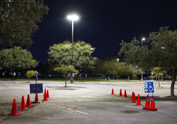 A car-side voting location is empty at Prairie View A&M University Northwest polling station in Houston on Friday, Oct. 30, 2020. The location was one of the eight Harris County's 24-hour locations. ( Elizabeth Conley/Houston Chronicle via AP)