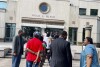 A line of people wait outside the federal courthouse in Birmingham, Ala., on Monday, Aug. 14, 2023. to watch the Aug. 14, 2023 hearing. A three-judge panel is reviewing Alabama's new congressional districts. They will decide whether to let the map stand or step in and draw districts for the state. (AP Photo/Kim Chandler)