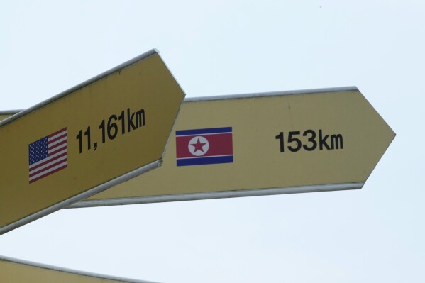 Destination signs to North Korea's capital Pyongyang and the United States are seen at the Imjingak Pavilion in Paju, South Korea, near the border with North Korea, Thursday, July 20, 2023. North Korea wasn't responding Thursday to U.S. attempts to discuss the American soldier who bolted across the heavily armed border and whose prospects for a quick release are unclear at a time of high military tensions and inactive communication channels. (AP Photo/Ahn Young-joon)