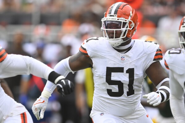 FILE - Cleveland Browns defensive tackle Mike Hall Jr. (51) works at the line of scrimmage during an NFL preseason football game against the Green Bay Packers, Saturday, Aug. 10, 2024, in Cleveland. (AP Photo/David Richard, File)