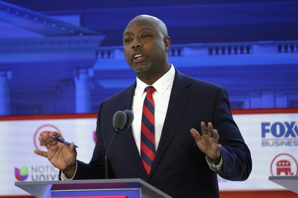 Sen. Tim Scott, R-S.C., speaks during a Republican presidential primary debate hosted by FOX Business Network and Univision, Wednesday, Sept. 27, 2023, at the Ronald Reagan Presidential Library in Simi Valley, Calif. (AP Photo/Mark J. Terrill)