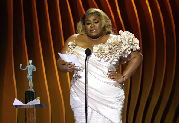 Da'vine Joy Randolph accepts the award for outstanding performance by a female actor in a supporting role for "The Holdovers" during the 30th annual Screen Actors Guild Awards on Saturday, Feb. 24, 2024, at the Shrine Auditorium in Los Angeles. (AP Photo/Chris Pizzello)
