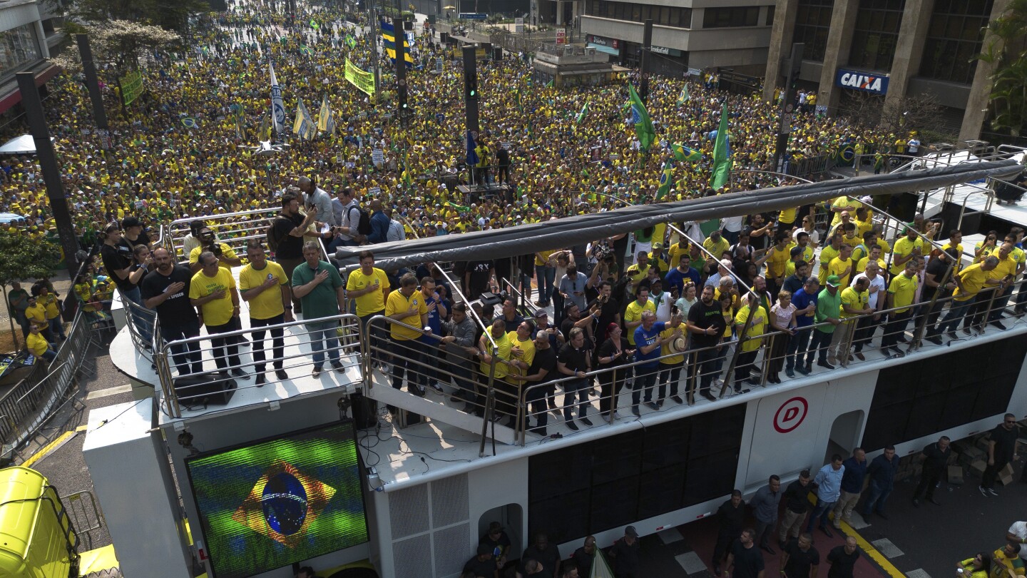 Demonstrators take part in a protest calling for the impeachment of Supreme Court Minister Alexandre de Moraes, who recently imposed a nationwide bloc