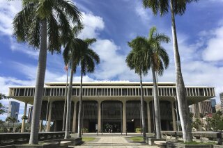 
              The Hawaii State Capitol in Honolulu on Friday, March 1, 2019. A bill that would have legalized marijuana in the islands fizzled and died Friday as Hawaii legislative leaders worried about contradicting federal law and jeopardizing the state's existing medical marijuana program. (AP Photo/Audrey McAvoy)
            