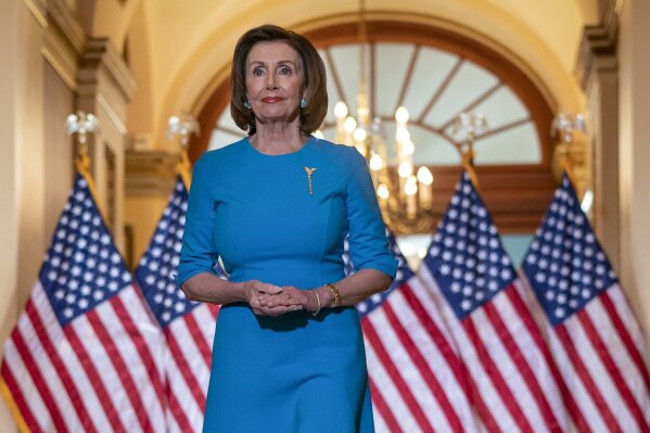 Speaker of the House Nancy Pelosi, D-Calif., arrives to make a statement about a coronavirus aid package, on Capitol Hill in Washington, Friday, March 13, 2020. (AP Photo/J. Scott Applewhite)