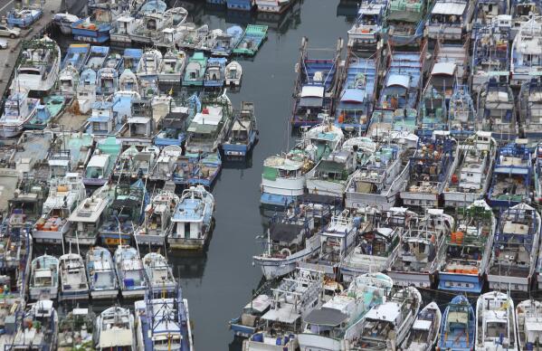 File - In this Aug. 6, 2015, file photo, fishing boats are secured in a port during foul weather in Yilan County, northeastern Taiwan. Taiwan has applied to join an 11-nation Pacific trade group, Cabinet officials said Thursday, Sept. 23, 2021, setting up a potential clash with rival Beijing over the status of the island democracy. (AP Photo/Wally Santana, File)