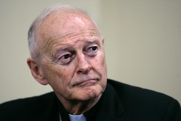 FILE - Former Washington Archbishop, Cardinal Theodore McCarrick listens during a press conference in Washington, May 16, 2006. Lawyers for former Roman Catholic Cardinal McCarrick filed a motion Monday, Feb. 27, 2023, to dismiss a case charging him with sexually assaulting a boy decades ago, saying the 92-year-old once-powerful American prelate has dementia and is not competent to stand trial. (AP Photo/J. Scott Applewhite, File)