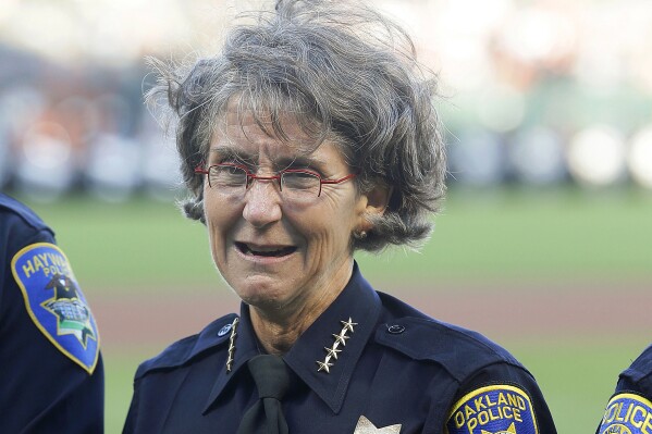 FILE - Oakland, Calif., Police Chief Anne Kirkpatrick stands before a baseball game, July 25, 2017, in San Francisco. New Orleans Mayor LaToya Cantrell said Monday, Sept. 11, 2023, that she has chosen Kirkpatrick, a former chief of police in Spokane, Wash., and Oakland, Calif., to head the New Orleans Police Department, a nomination subject to the approval of the City Council. (AP Photo/Jeff Chiu, File)