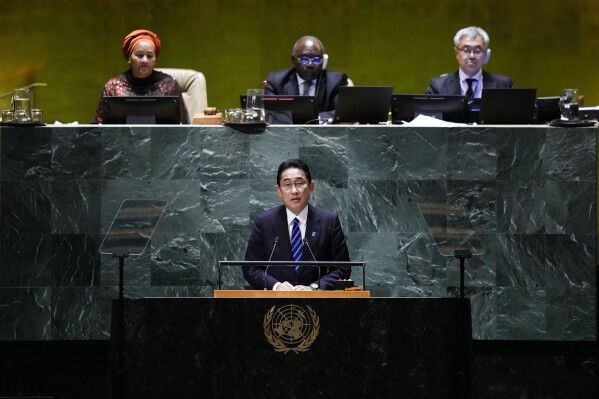 Japan's Prime Minister Fumio Kishida, bottom, addresses the 78th session of the United Nations General Assembly, Tuesday, Sept. 19, 2023, at U.N. headquarters. (AP Photo/Frank Franklin II)
