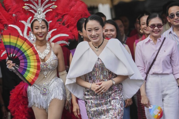Thailand's Prime Minister Paetongtarn Shinawatra attends the annual Pride Parade to celebrate the LGBTQ+ community’s Pride Month in Bangkok, Thailand, Sunday, June 1, 2025. (AP Photo/Sakchai Lalit)