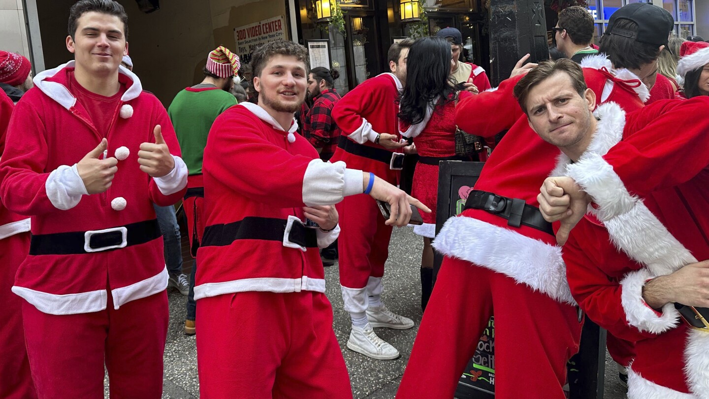Thousands descend on NYC for the annual Santa-themed bar crawl SantaCon