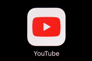 FILE - This March 20, 2018, file photo shows the YouTube app on an iPad. YouTube is making clear there will be no “birtherism” on its platform during this year's U.S. presidential election. Also banned: Election-related “deepfake” videos and anything that aims to mislead viewers about voting procedures and how to participate in the 2020 census. The Google-owned video service clarified its rules ahead of the Iowa caucuses Monday, Feb. 2, 2020. (AP Photo/Patrick Semansky, File)