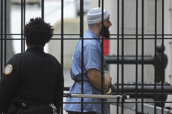 FILE - In this Feb. 3, 2016 file photo, Adnan Syed enters Courthouse East prior to a hearing in Baltimore. Maryland's highest court is set to hear arguments in the high-profile case of Syed whose murder conviction was chronicled in the hit "Serial" podcast. Two years after a new trial was ordered for Syed, the Maryland Court of Special Appeals on Thursday, Nov. 29, 2018, will hear oral arguments in the case. He was convicted in 2000 of strangling his ex-girlfriend and burying her body in a Baltimore park. Syed is serving a life sentence. (Barbara Haddock Taylor/The Baltimore Sun via AP, File)