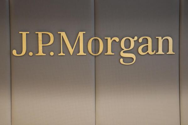 FILE - The logo of JPMorgan bank is pictured at the new French headquarters of JP Morgan bank, Tuesday, June 29, 2021, in Paris. JPMorgan Chase is defending itself against a lawsuit by the U.S. Virgin Islands accusing it of empowering Jeffrey Epstein to abuse teenage girls. Lawyers for the giant bank said in court papers Tuesday, May 23, 2023, that it was the islands that enabled the financier to commit his crimes. (AP Photo/Michel Euler, Pool, File)