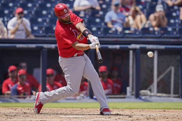 Pujols gets spring hit for Cards with wife in brain surgery